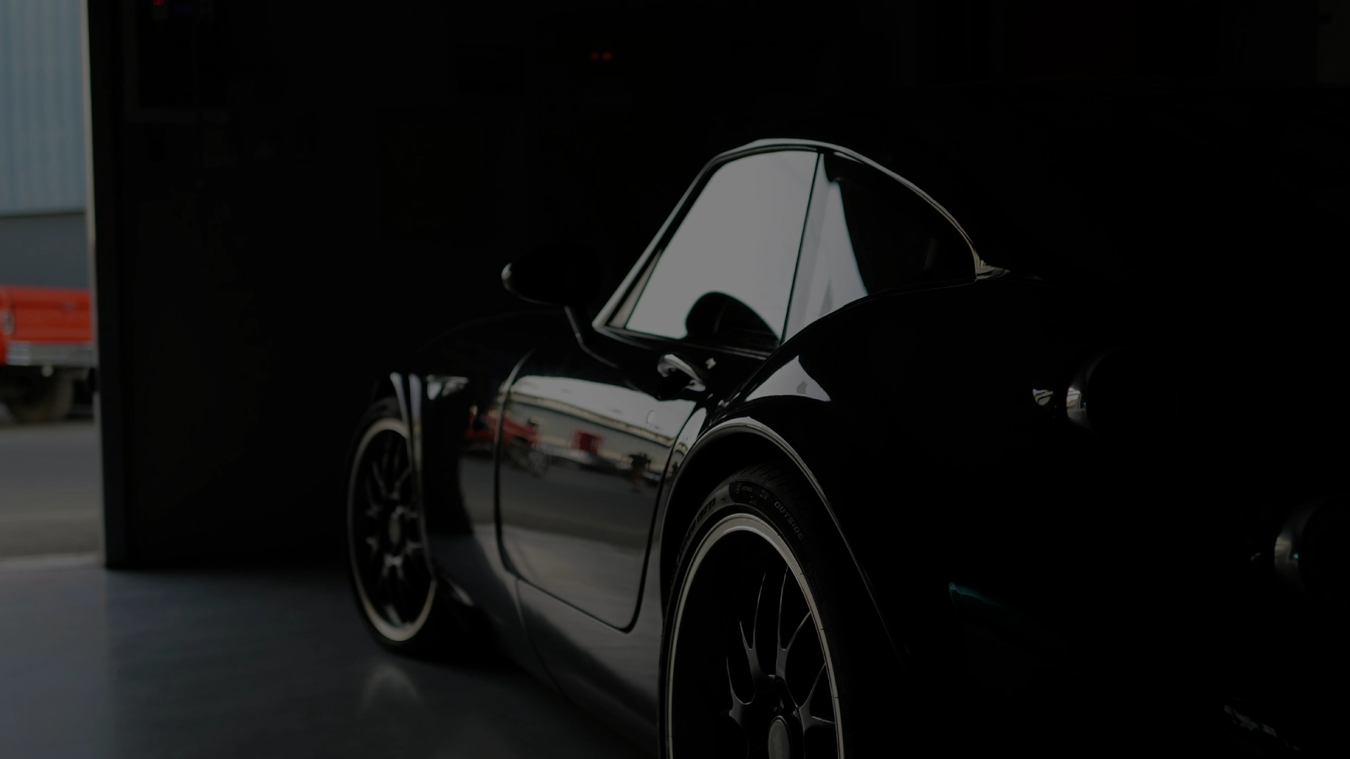 porche panamara parked inside a garage