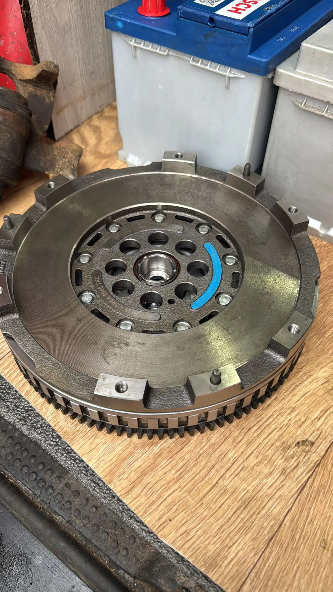 man servicing a car engine