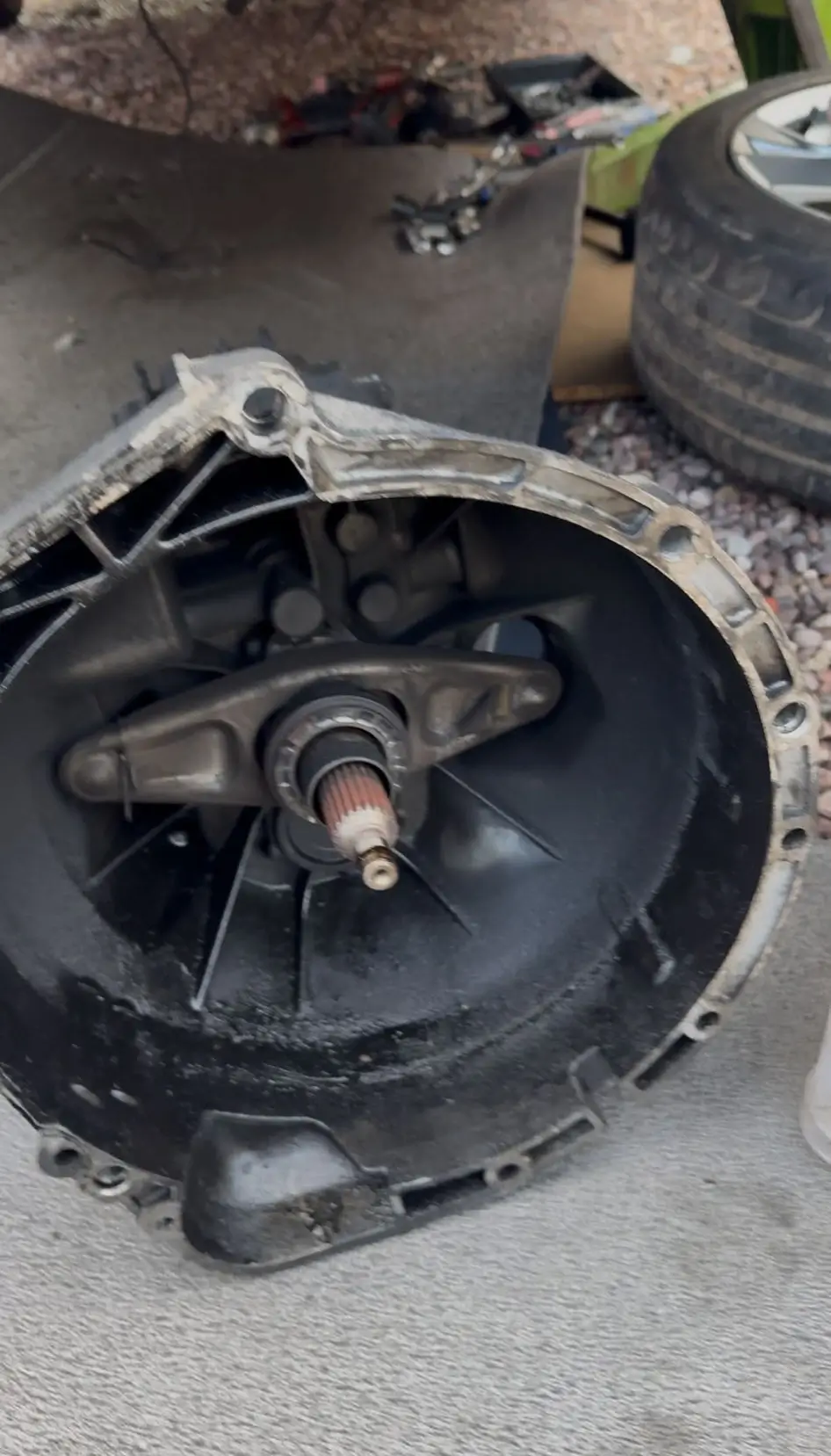 man servicing a car engine